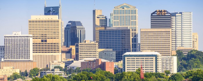 Nashville city buildings behind trees