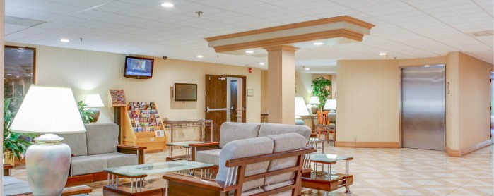Nashville International Airport Hotel About Alexis Inn And Hotel Lobby With Couches Coffee Table Marble Floors Brochure Stand