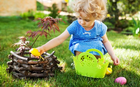 little girl on an easter egg hunt