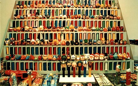 pez muesum. Vintage Pez dispensers line the entire wall.