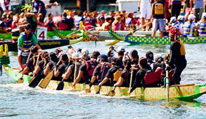 san francisco dragon racing. Crew rowing in authentic dragon boat
