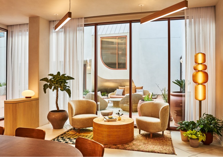 living room with chairs and table
