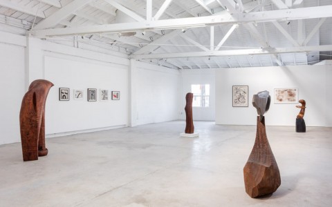gallery room with sculptures