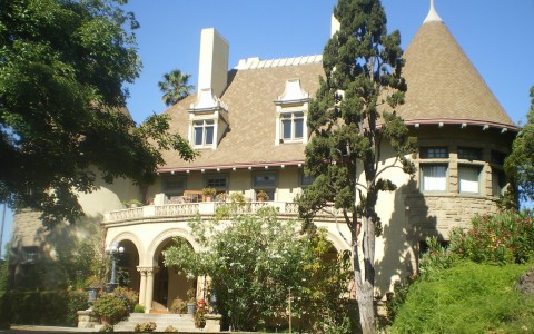 front view of house with trees