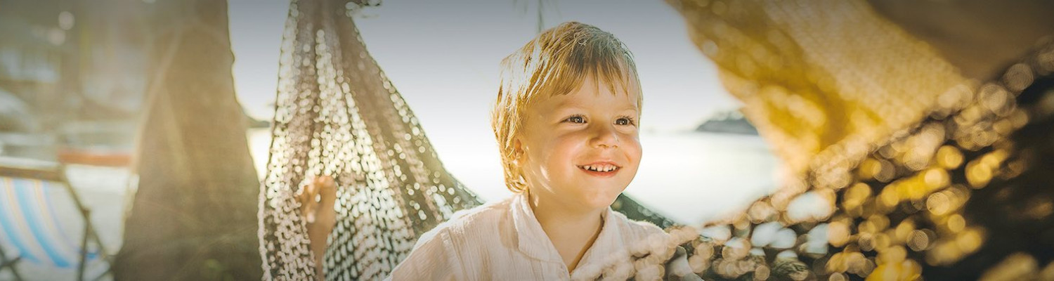 little boy on a hammock