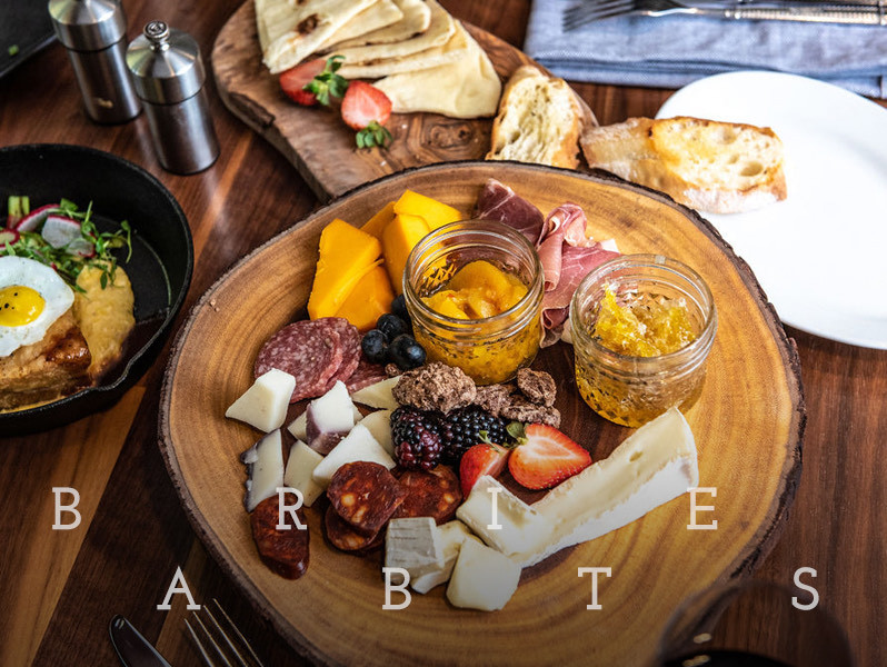 charcuterie board with a text overlay that says bar bites