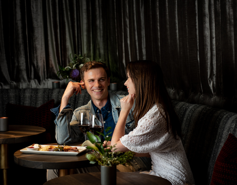 couple sitting at dinner table