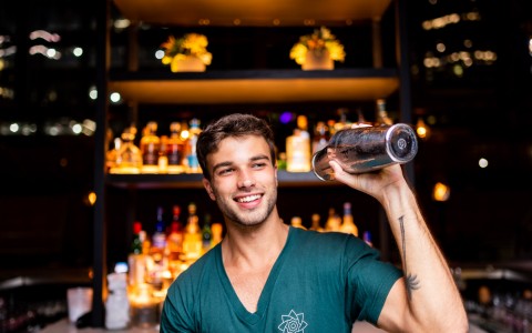 bartender shaking a cocktail shaker