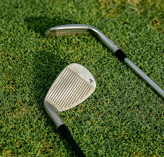 Top view of two golf sticks