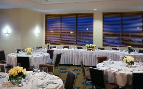 banquet tables set for formal event