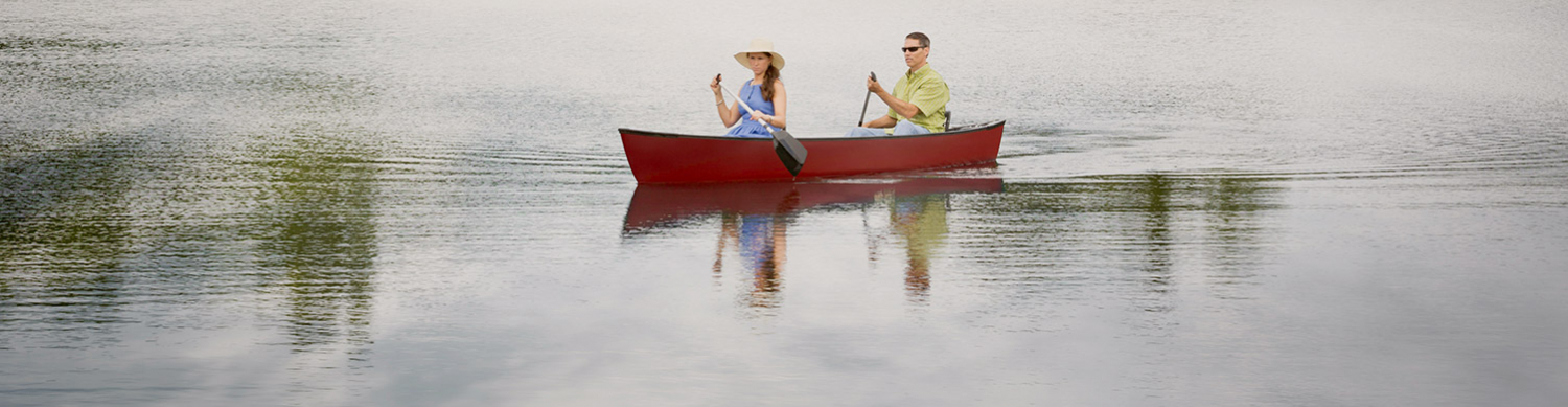 couple in a canoe on the lake