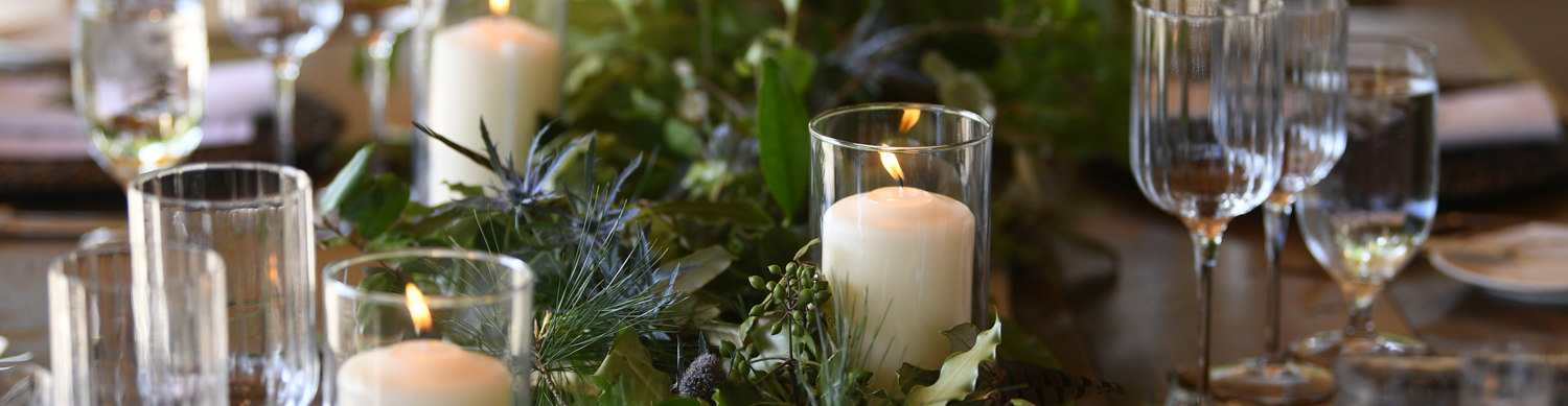 candles on a dining table header