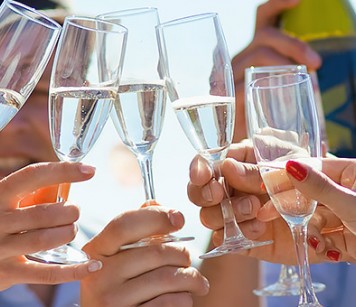 Group of friends toasting with champagne