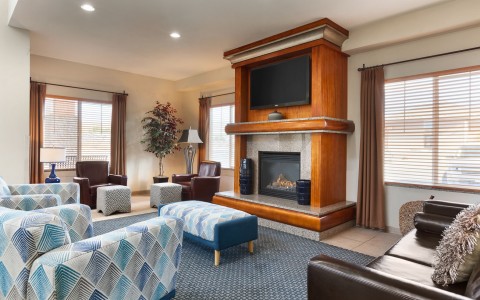 Guest Suite Living Area with Fireplace and Sofas