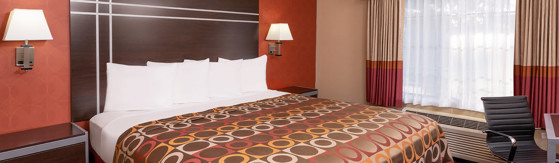 queen size bed in hotel room