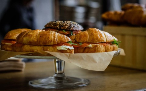 croissant sandwiches on a platter 