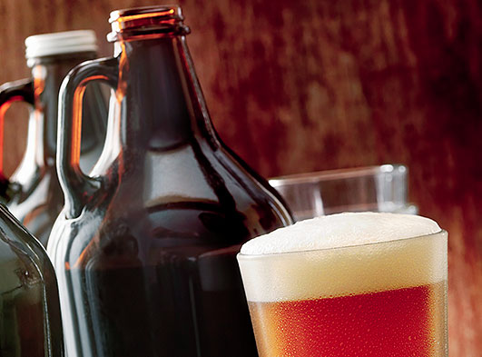 Beer growler and pint of beer
