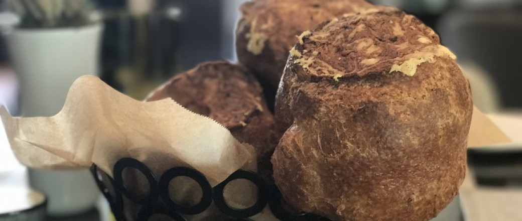 Bread in a basket on table
