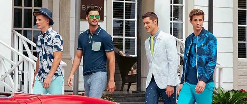 Four men walking past the Betsy Hotel