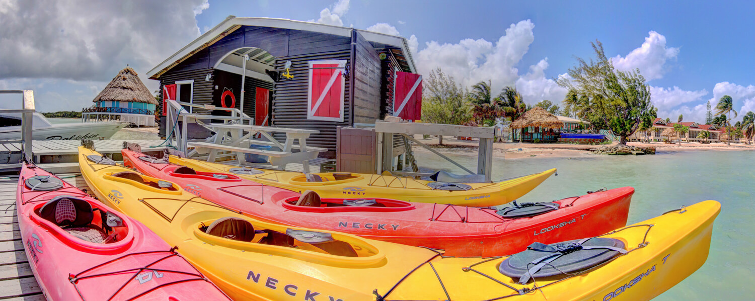 black bird caye resort header kayaking