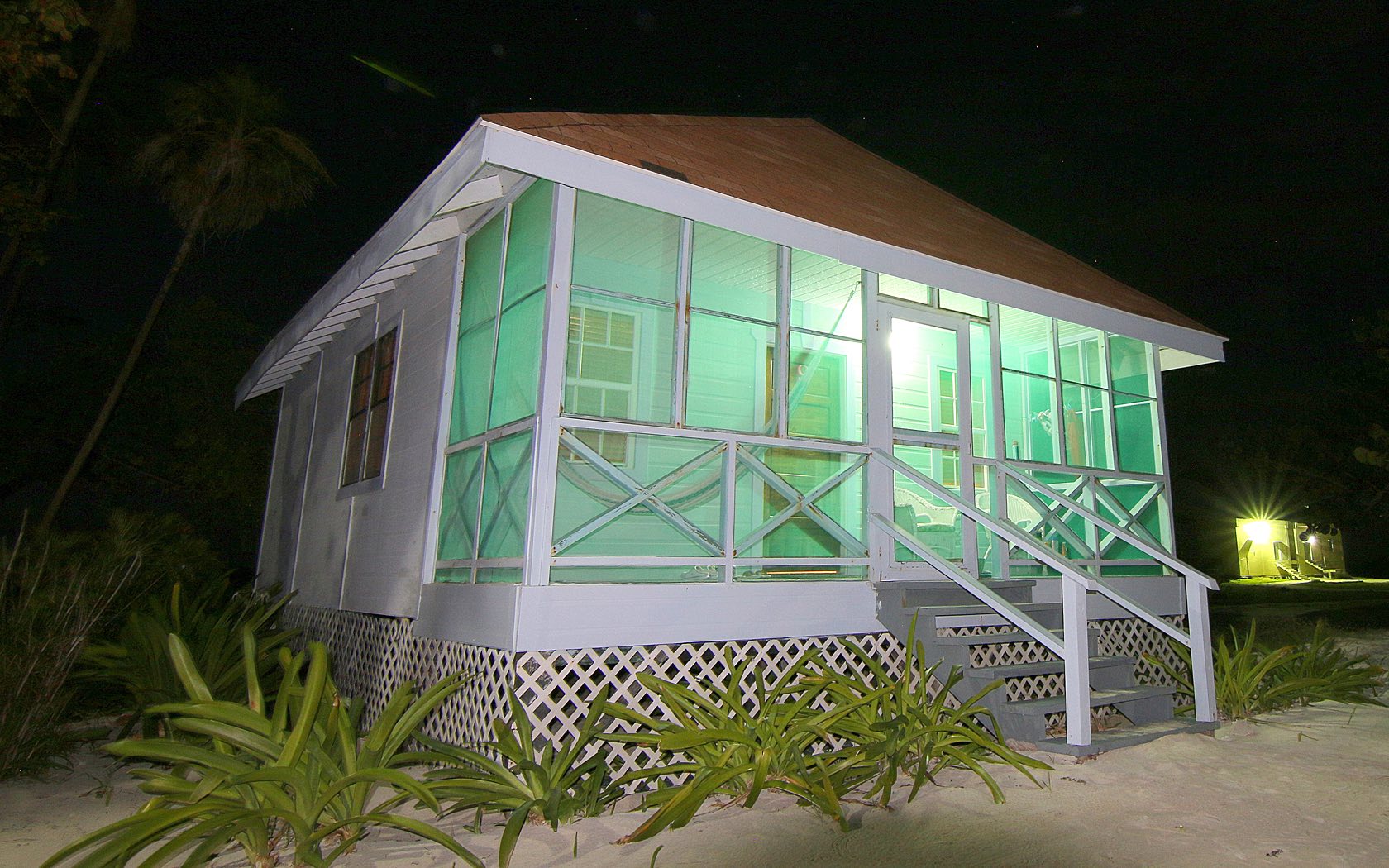 green superior cabana illuminated at night
