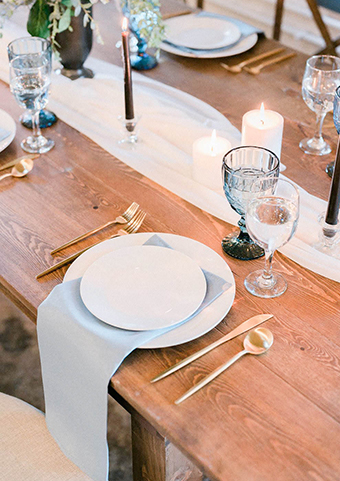 Top view of a table with fancy plates and cutlery