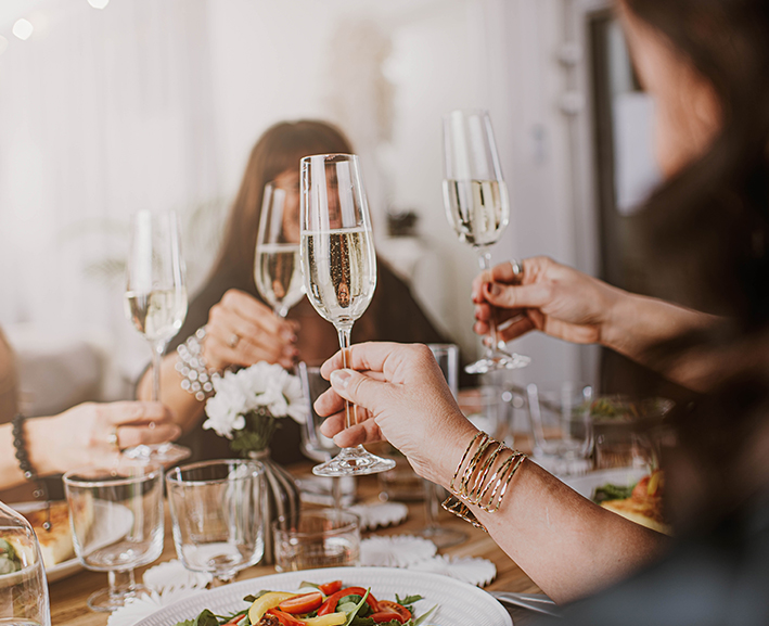 A group of people toasting with champaign
