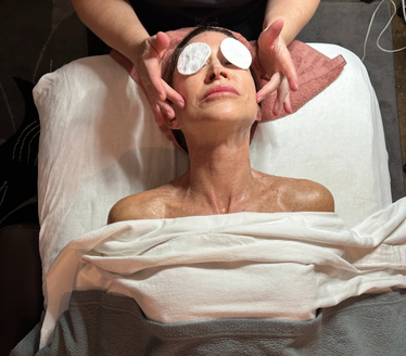 Woman receiving a spa facial