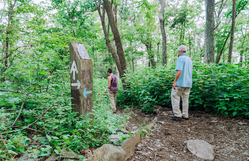 man and woman hiking