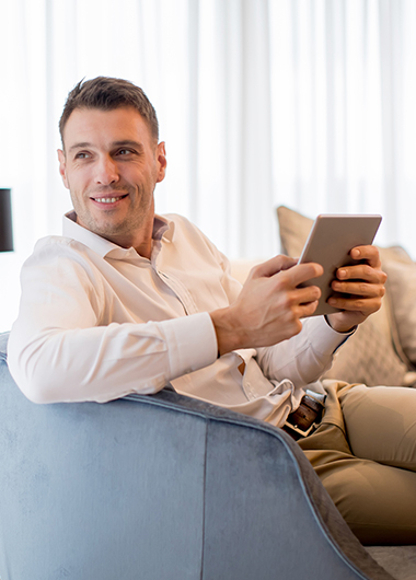 Man looking at a tablet
