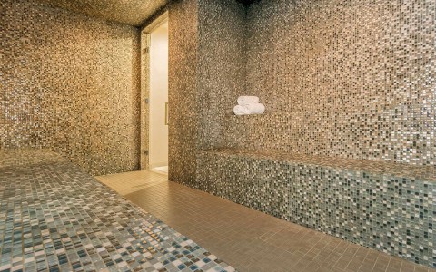 inside of a tiled sauna 