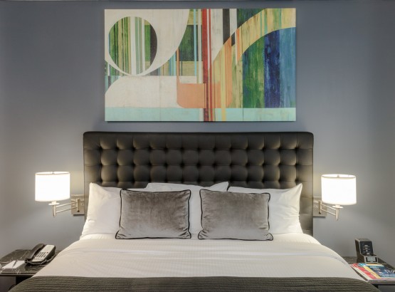 Rooms And Suites Broadway Plaza Hotel Accommodations King Size Bed Art Above The Nightstands And Lamps On Each Side
