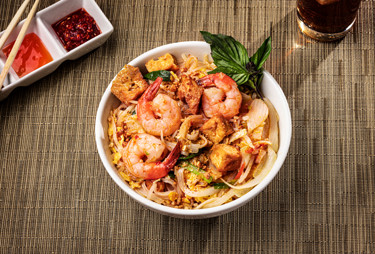 Aerial view of a bowl of shrimp ramen.