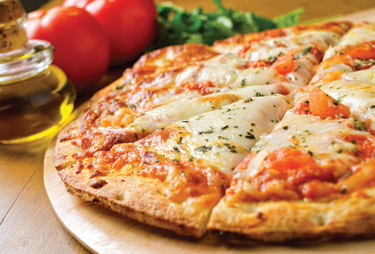 A close up of a cheese pizza.