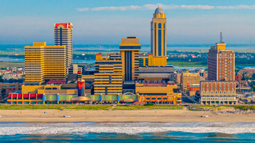 A panoramic view of the coastline with multi-colored buildings.