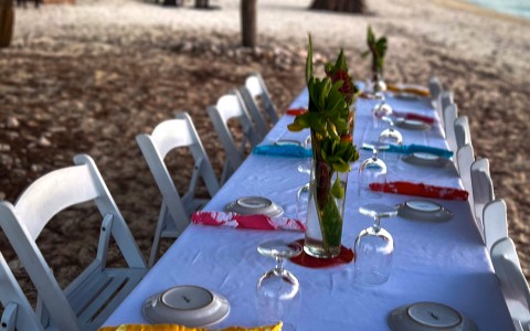 view of a table set for an event in the beach