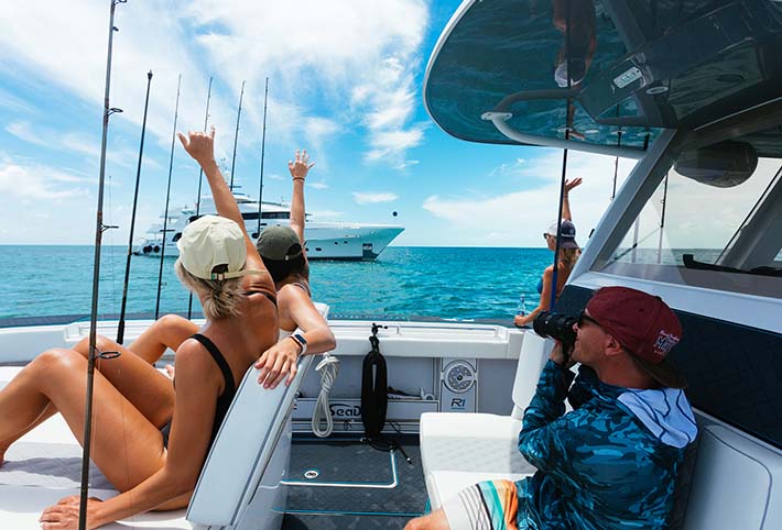 Happy people on a fishing boat