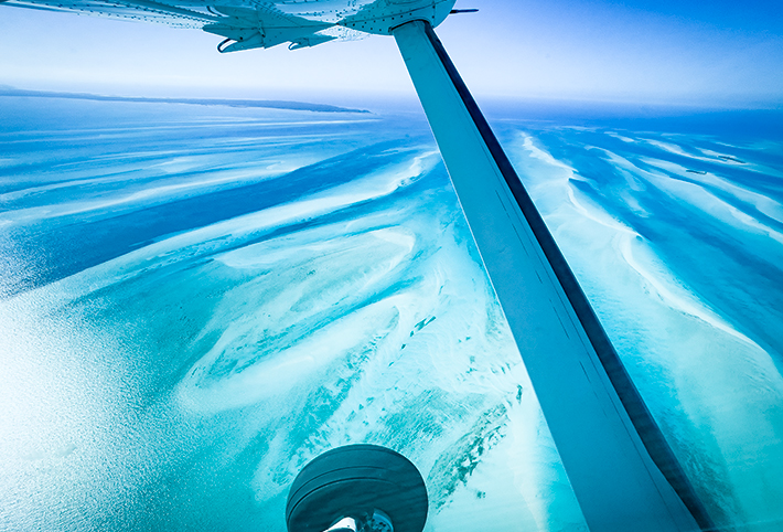 Aerial view of the ocean from an airplane