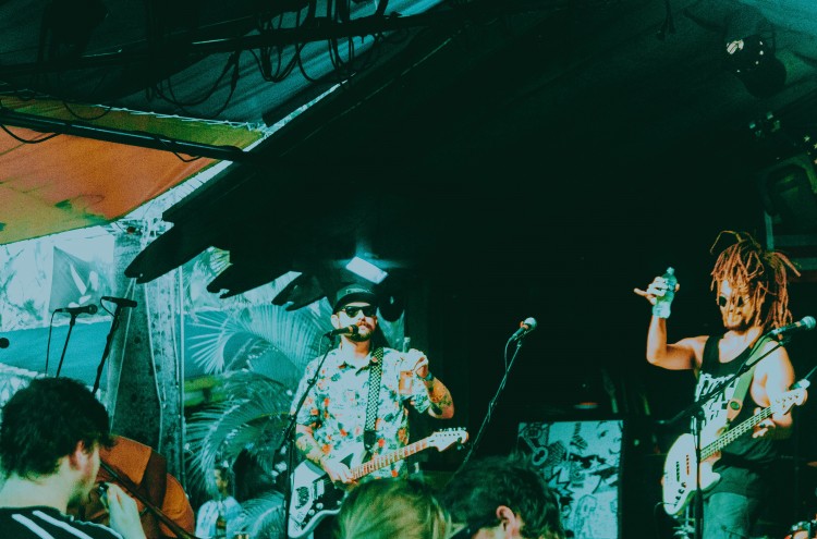 musicians playing on a stage