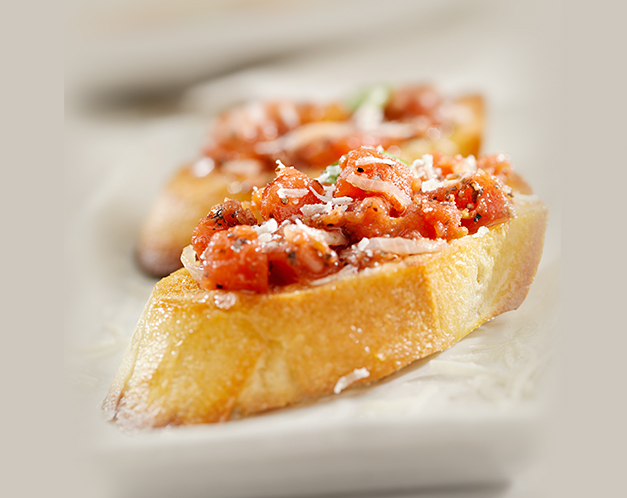 tomato bruchetta on a slice of bread