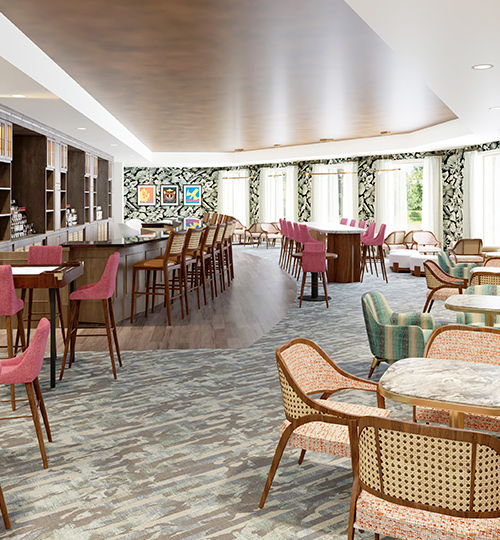 inside of rum bacardi bar with pink and green seating