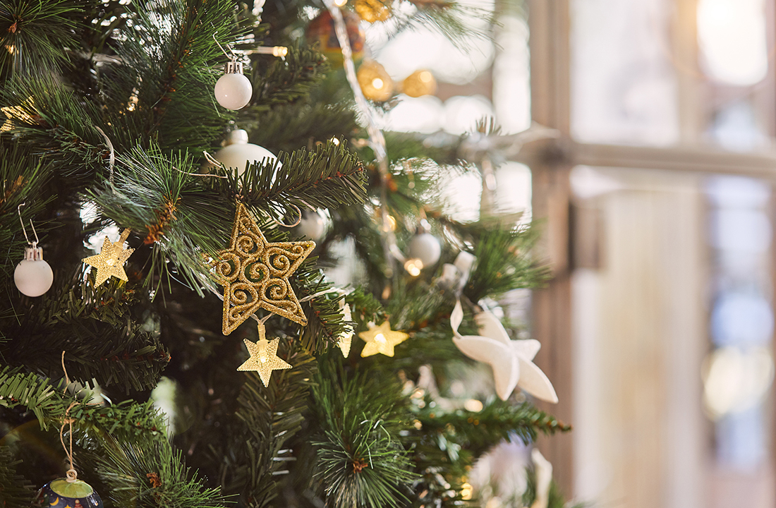 Christmas tree with star ornaments and lights