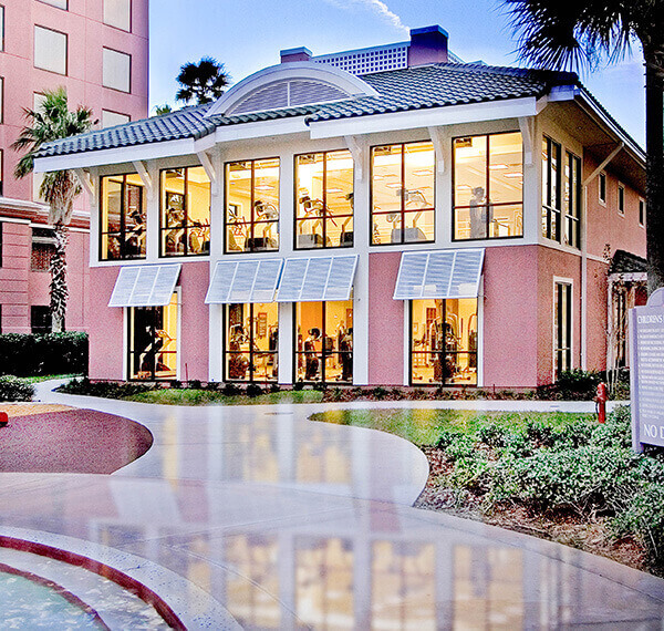 exterior image of fitness center with pink walls