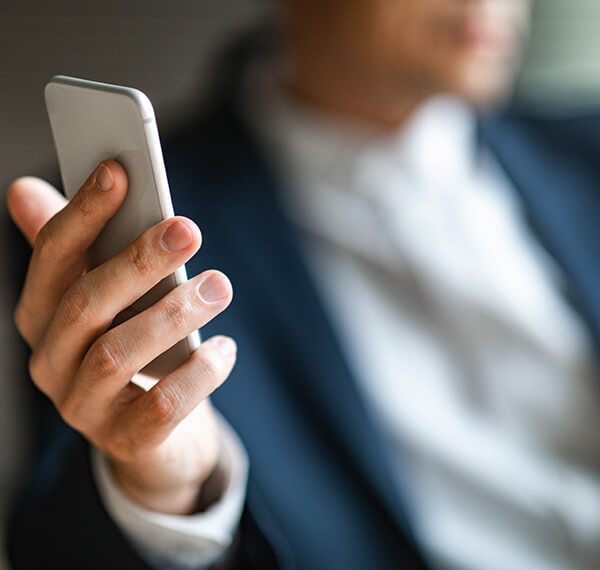 close up image of a person holding a phone
