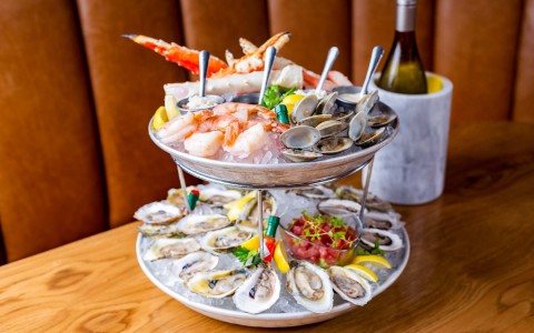 chilled 2 tier seafood platter with wine bottle