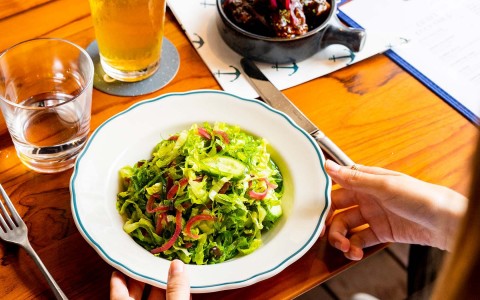 Green salad on table 