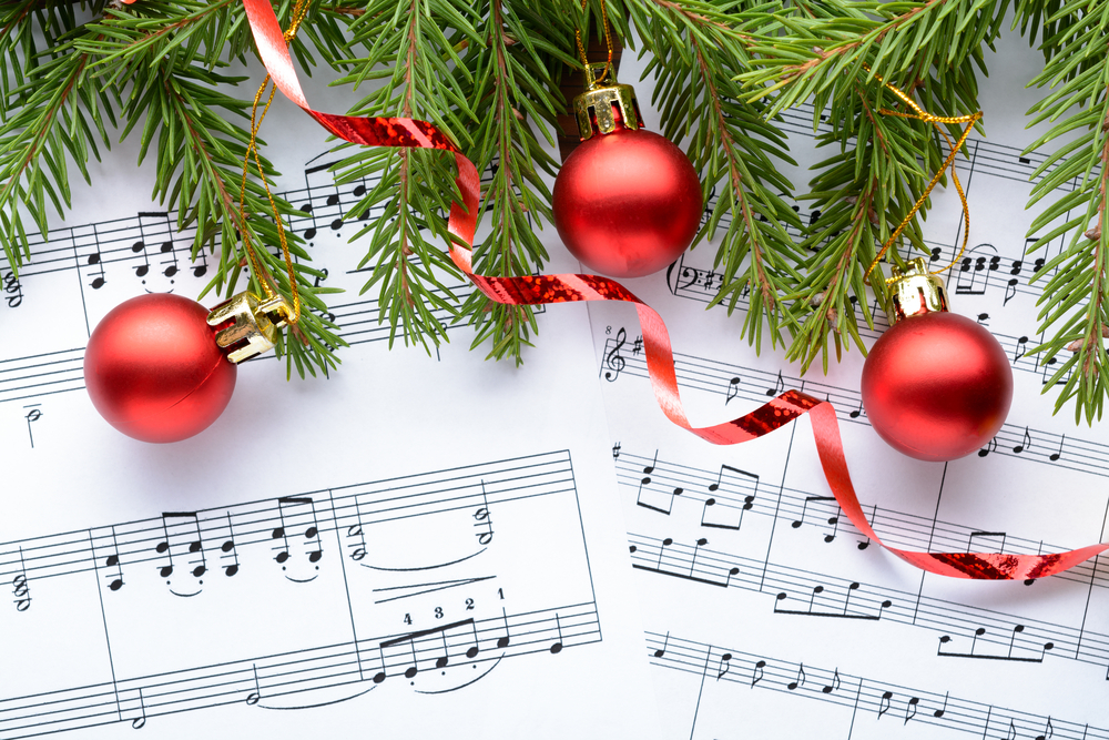 holiday sheet music with christmas ornaments
