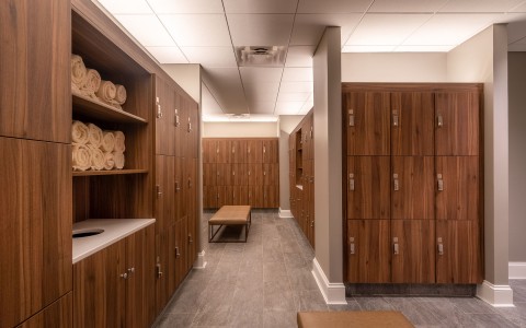 locker room at the spa with towels on shelves