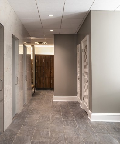 spa locker room corridor with different doors that are closed