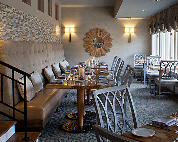 dining room at restaurant with half booth seating along one wall